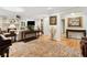Elegant living room with hardwood floors, fireplace, and lots of natural light at 5155 Pine Branch Pt, Atlanta, GA 30338