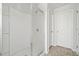 Bathroom with glass shower doors and tile flooring at 3016 Creekside Overlook Way, Austell, GA 30168