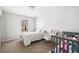 Inviting bedroom features a crib, twin bed, and window, perfect for a Bedroom or ' room at 3016 Creekside Overlook Way, Austell, GA 30168