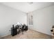 Neutral-toned bedroom, furnished as an office with a desk and minimalist decor at 3016 Creekside Overlook Way, Austell, GA 30168