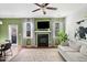 Inviting living room with a fireplace and stylish decor at 3016 Creekside Overlook Way, Austell, GA 30168