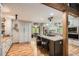 Modern kitchen with granite countertops, stainless steel appliances, and an island with seating at 5419 Tyree Rd, Winston, GA 30187
