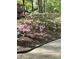 Lush yard featuring colorful azaleas and beautiful landscaping, creating a welcoming and vibrant outdoor space at 5419 Tyree Rd, Winston, GA 30187