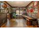 Finished basement with a pinball machine and shuffleboard table. Perfect for entertaining guests at 7048 Bennington Ln, Cumming, GA 30041