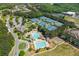 Aerial view of community amenities, including pool, tennis courts, and a basketball court at 7048 Bennington Ln, Cumming, GA 30041