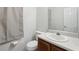 Neutral bathroom featuring a vanity with a sink and a mirror, alongside a toilet at 1031 Bettina Sw Ct, Mableton, GA 30126
