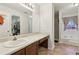 Functional bathroom with vanity, sink, and ample counter space with tub and shower at 1031 Bettina Sw Ct, Mableton, GA 30126