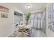 Bright laundry room with dining table, washer and dryer hookups, and natural light at 1031 Bettina Sw Ct, Mableton, GA 30126