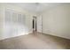 Bedroom with carpeted floors, closet, and doorway for easy access at 1229 Colony Cir, Marietta, GA 30068