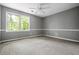 Bedroom with a ceiling fan and a window offering a view of the outdoors at 1229 Colony Cir, Marietta, GA 30068
