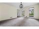Light-filled dining room featuring modern light fixture and large windows at 1229 Colony Cir, Marietta, GA 30068