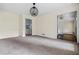 Open-concept dining area with contemporary light fixture and multiple entryways at 1229 Colony Cir, Marietta, GA 30068