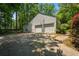 Spacious two-car garage with an adjacent driveway and walkway, providing ample parking and easy access at 1229 Colony Cir, Marietta, GA 30068