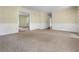 Spacious living room with neutral carpet and decorative trim detail at 1229 Colony Cir, Marietta, GA 30068
