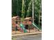 Community playground featuring slides and play areas surrounded by green space at 1229 Colony Cir, Marietta, GA 30068