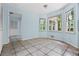 Cozy room with tile floor, windows with outdoor views and access to a closet at 1229 Colony Cir, Marietta, GA 30068