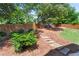 Landscaped backyard featuring a stepping stone path and a wooden fence at 2265 Venture Dr, Marietta, GA 30062