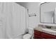 Neutral bathroom with granite vanity, a toilet and bathtub with shower curtain at 2265 Venture Dr, Marietta, GA 30062