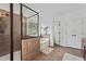 Bathroom featuring a separate shower and tub and access to closet at 2265 Venture Dr, Marietta, GA 30062