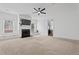 Spacious bonus room featuring a cozy fireplace, built-in window seats, and natural light at 2265 Venture Dr, Marietta, GA 30062