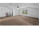 Spacious bonus room with ample natural light, neutral walls, and carpeted floors at 2265 Venture Dr, Marietta, GA 30062