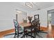 Traditional dining room with decorative rug, light fixture and trim at 2265 Venture Dr, Marietta, GA 30062
