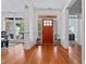 Inviting foyer with hardwood flooring, a glass paned front door, and ample light at 2265 Venture Dr, Marietta, GA 30062