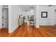 Bright foyer with hardwood floors, wainscoting, and a view of the staircase at 2265 Venture Dr, Marietta, GA 30062