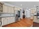 Well-lit kitchen featuring hardwood floors, granite counters, and stainless steel appliances at 2265 Venture Dr, Marietta, GA 30062