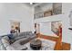 Open living room with high ceilings flows into the kitchen and features hardwood floors at 2265 Venture Dr, Marietta, GA 30062