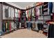Large walk-in closet with custom shelving and ample storage space at 2265 Venture Dr, Marietta, GA 30062
