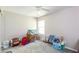 Bright and open bedroom with neutral paint, plush carpeting, and a large window at 314 Meadows Ln, Canton, GA 30114
