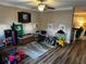 ' playroom features hardwood floors, ceiling fan, and fun decorations at 314 Meadows Ln, Canton, GA 30114