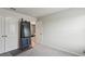 This bedroom is carpeted and has doors to a closet and bathroom at 4724 Electric Sw Ave, Mableton, GA 30126