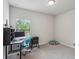 Bedroom with a built-in shelf and desk with bright lighting at 4724 Electric Sw Ave, Mableton, GA 30126