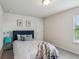 Bedroom featuring a comfortable bed and a calming color scheme at 4724 Electric Sw Ave, Mableton, GA 30126