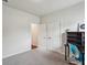 Bedroom with a closet and desk, perfect for an office or guest room at 4724 Electric Sw Ave, Mableton, GA 30126