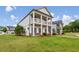 Charming two-story home with landscaped yard and front porch at 4724 Electric Sw Ave, Mableton, GA 30126