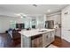 Bright kitchen and living room featuring stainless steel appliances and island at 4724 Electric Sw Ave, Mableton, GA 30126