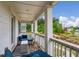 Cozy covered porch with comfortable seating, perfect for relaxing and enjoying the view at 4724 Electric Sw Ave, Mableton, GA 30126
