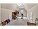 Spacious bonus room with natural light, ample storage, and versatile space for any hobby at 1720 Ivey Trce, Cumming, GA 30041