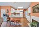 Eat-in kitchen featuring granite countertops, an island with seating, and stainless steel appliances at 1720 Ivey Trce, Cumming, GA 30041