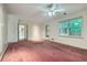 Bright, open living room with neutral walls and a view to the outside at 2034 Starfire Ne Dr, Atlanta, GA 30345