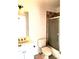 Standard bathroom features a shower, toilet, and vanity with sink and updated tile at 3306 Chastain Ridge Dr, Marietta, GA 30066