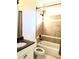 Bathroom featuring tiled shower and tub combo, and granite countertop vanity at 3306 Chastain Ridge Dr, Marietta, GA 30066
