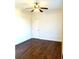 Cozy bedroom featuring hardwood floors and a ceiling fan with lighting fixture at 3306 Chastain Ridge Dr, Marietta, GA 30066
