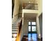 Bright foyer with hardwood floors, a staircase, and a view into the living room at 3306 Chastain Ridge Dr, Marietta, GA 30066