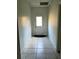Hallway featuring tile flooring and a white door leading to the outside at 3306 Chastain Ridge Dr, Marietta, GA 30066