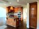 Elegant kitchen with wood cabinets, granite countertops, stainless appliances, and large island for meal prep at 3306 Chastain Ridge Dr, Marietta, GA 30066
