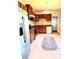 Spacious kitchen with wooden cabinets, stainless steel appliances, decorative tile, and eat-in area at 3306 Chastain Ridge Dr, Marietta, GA 30066